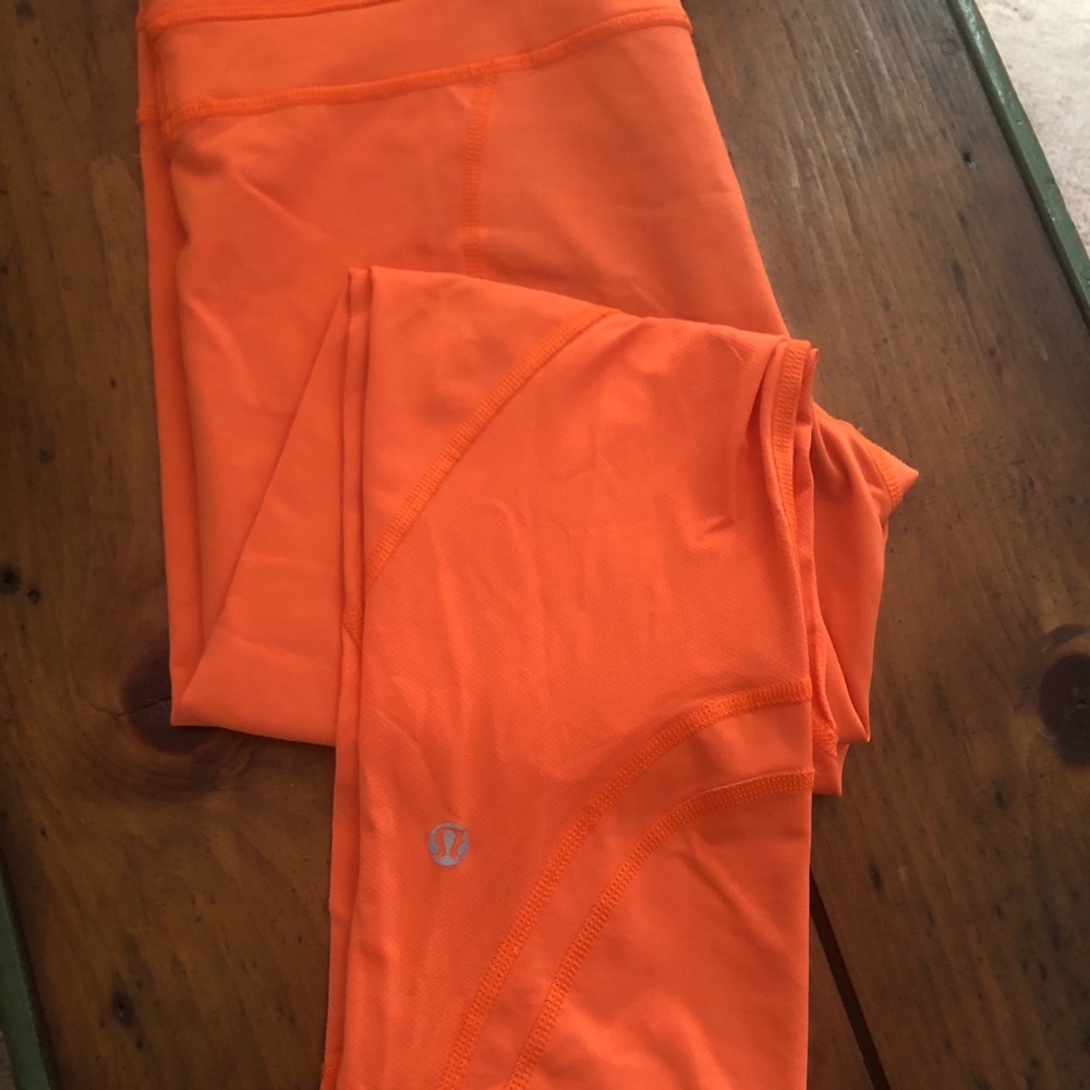 Orange Lululemon calf length leggings